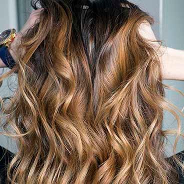 Garnier Fructis Sleek and Shine Flat Iron Perfector Straightening Mist - Bedhead Waves - key to shiny hairstyle is using heat-protecting product with wide-barrel curling wand